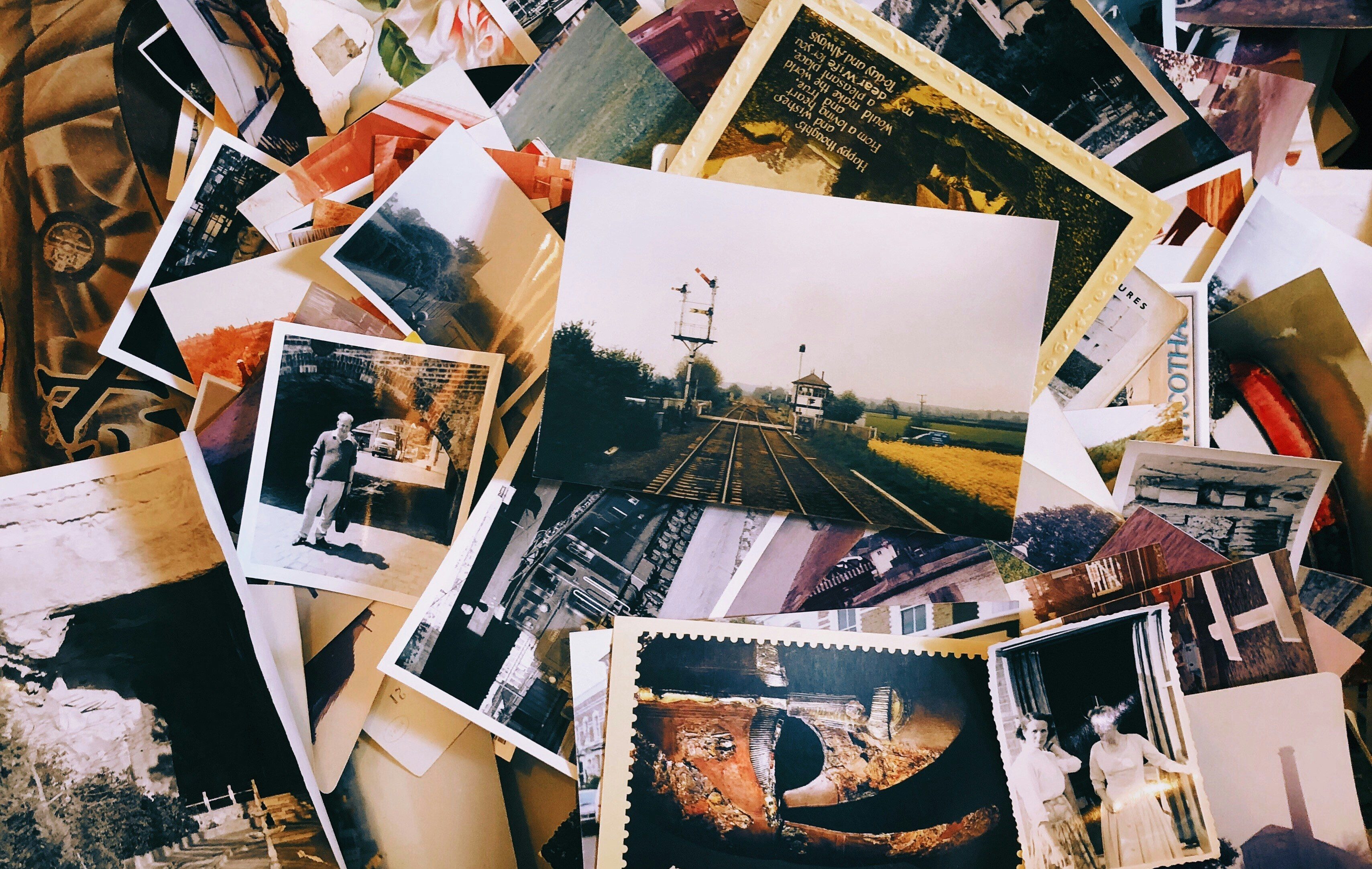 Photo by <a href="https://unsplash.com/@jontyson?utm_source=unsplash&utm_medium=referral&utm_content=creditCopyText">Jon Tyson</a> on <a href="https://unsplash.com/photos/a-pile-of-old-photos-and-postcards-sitting-on-top-of-each-other-P2aOvMMUJnY?utm_source=unsplash&utm_medium=referral&utm_content=creditCopyText">Unsplash</a>